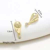 1 Pair XUPING Simple Style Commute Geometric Dolphin Skull Plating Inlay Copper Artificial Gemstones 18K Gold Plated Ear Studs sku image 3