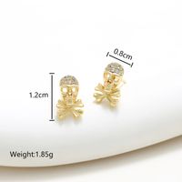 1 Pair XUPING Simple Style Commute Geometric Dolphin Skull Plating Inlay Copper Artificial Gemstones 18K Gold Plated Ear Studs main image 2