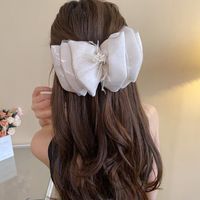 Women's Casual Simple Style Bow Knot Alloy Cloth Inlay Artificial Pearls Hair Clip main image 2