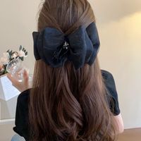 Women's Casual Simple Style Bow Knot Alloy Cloth Inlay Artificial Pearls Hair Clip main image 1