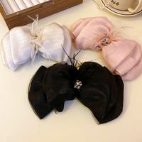 Women's Casual Simple Style Bow Knot Alloy Cloth Inlay Artificial Pearls Hair Clip main image 3
