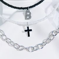 Einfacher Stil Klassischer Stil Kreuzen Brief Saatperle Kupfer Perlen Inlay Künstlicher Kristall Frau Armbänder sku image 2