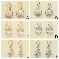 1 Piece Sweet Simple Style Round Letter Bow Knot Hollow Out Inlay Alloy Pearl Zircon Drop Earrings main image 1