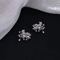 1 Pair Basic Modern Style Classic Style Geometric Inlay Alloy Artificial Pearls Rhinestones Ear Studs main image 1