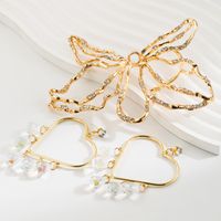 French Style Shiny Heart Shape Butterfly Hollow Out Inlay Zinc Alloy Rhinestones 14K Gold Plated Drop Earrings Ear Cuffs main image 1