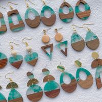 1 Pair Streetwear Simple Style Geometric Hollow Out Alloy Resin Wood Drop Earrings main image 1