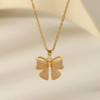 304 Stainless Steel Copper 18K Gold Plated Casual Vintage Style Dreamcatcher Heart Shape Bow Knot Pendant Necklace main image 5