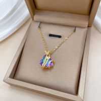 Wholesale Casual Simple Style Classic Style Hand Butterfly Titanium Steel Copper Hollow Out Inlay Zircon Pendant Necklace main image 3