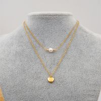 304 Stainless Steel Titanium Steel Gold Plated Simple Style Inlay Heart Shape Artificial Pearls Double Layer Necklaces Sweater Chain main image 1