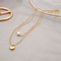 304 Stainless Steel Titanium Steel Gold Plated Simple Style Inlay Heart Shape Artificial Pearls Double Layer Necklaces Sweater Chain main image 3