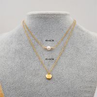 304 Stainless Steel Titanium Steel Gold Plated Simple Style Inlay Heart Shape Artificial Pearls Double Layer Necklaces Sweater Chain main image 2