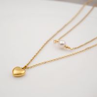 304 Stainless Steel Titanium Steel Gold Plated Simple Style Inlay Heart Shape Artificial Pearls Double Layer Necklaces Sweater Chain main image 5
