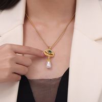 Freshwater Pearl Titanium Steel Copper 18K Gold Plated Retro Artistic Snake Hollow Out Inlay Glass Glass Bead Pendant Necklace sku image 1