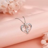 Copper IG Style MAMA Shiny Cross Heart Shape Rose Hollow Out Inlay Zircon Pendant Necklace main image 1