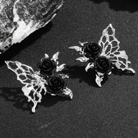 1 Paar Einfacher Stil Blume Schmetterling Inlay Legierung Harz Ohrstecker main image 4