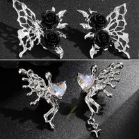 1 Pair Simple Style Flower Butterfly Inlay Alloy Resin Ear Studs main image 1