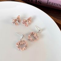 1 Pair Sweet Simple Style Bow Knot Inlay Alloy Zircon Ear Studs main image 4