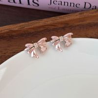 1 Pair Sweet Simple Style Bow Knot Inlay Alloy Zircon Ear Studs main image 9