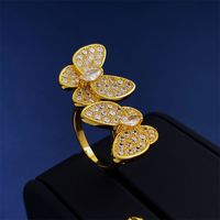 Venta Al Por Mayor Estilo Simple Mariposa Cobre Enchapado Embutido Chapados en oro de 18k Circón Anillos Abiertos sku image 2