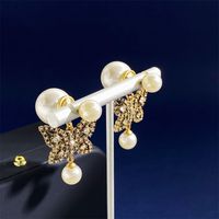 1 Pair Simple Style Commute Butterfly Plating Inlay Copper Rhinestones Pearl 18K Gold Plated Drop Earrings main image 5