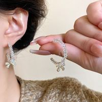 Elegant Simple Style Bow Knot Alloy Plating Artificial Crystal Rhinestones Women's Drop Earrings 1 Pair main image 5