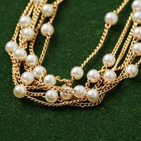 Cobre Chapados en oro de 18k Elegante Glamour Geométrico Con Cuentas Embutido Perlas Artificiales Aretes Collar main image 3