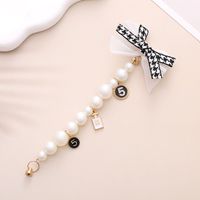 Simple Style Heart Shape Bow Knot Imitation Pearl Beaded Plating Inlay Rhinestones Mobile Phone Chain main image 3