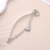 Simple Style Heart Shape Bow Knot Imitation Pearl Beaded Plating Inlay Rhinestones Mobile Phone Chain sku image 7