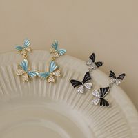 1 Paire Style Simple Style Classique Papillon Placage Le Cuivre Plaqué Or 18K Boucles D'oreilles main image 1