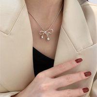 Stainless Steel Gold Plated Casual Simple Style Bow Knot Plating Pendant Necklace main image 3
