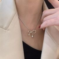 Stainless Steel Gold Plated Casual Simple Style Bow Knot Plating Pendant Necklace main image 4
