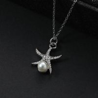 Simple Style Star Alloy Steel Asymmetrical Inlay Artificial Pearls Women's Pendant Necklace sku image 2