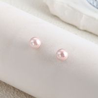 1 Pair Elegant Solid Color Inlay Stainless Steel Shell Artificial Pearls Shell Ear Studs main image 1