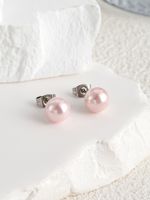 1 Pair Elegant Solid Color Inlay Stainless Steel Shell Artificial Pearls Shell Ear Studs main image 4