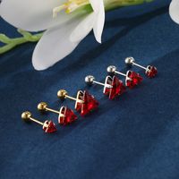 1 Pair XUPING Simple Style Shiny Triangle Inlay 304 Stainless Steel Artificial Gemstones 18K Gold Plated Raw Steel Ear Studs main image 1