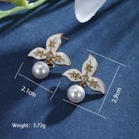 1 Pair XUPING Sweet Dolphin Heart Shape Pearl Enamel Inlay 304 Stainless Steel Artificial Gemstones Artificial Pearls 18K Gold Plated Drop Earrings main image 3