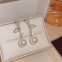 1 Piece IG Style Pearl Bow Knot Inlay Alloy Zircon 18K Gold Plated Drop Earrings main image 5
