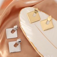 1 Pair Elegant Simple Style Geometric Asymmetrical Three-dimensional Copper K Gold Plated White Gold Plated Ear Studs main image 2