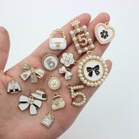 10 Pièces/Paquet Alliage Strass Perle Forme De Cœur Fleur Noeud D'Arc Brillant Pendentif main image 10