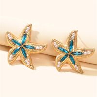 1 Pair Simple Style Classic Style Starfish Inlay Zinc Alloy Pearl Zircon Ear Studs main image 3