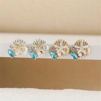 1 Pair Simple Style Classic Style Starfish Inlay Zinc Alloy Pearl Zircon 14K Gold Plated Ear Studs main image 4
