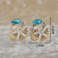 1 Pair Simple Style Classic Style Starfish Inlay Zinc Alloy Pearl Zircon 14K Gold Plated Ear Studs main image 2