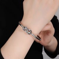 Stainless Steel 14K Gold Plated Vintage Style Simple Style Solid Color Knot Bangle main image 6