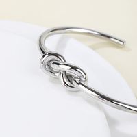 Stainless Steel 14K Gold Plated Vintage Style Simple Style Solid Color Knot Bangle main image 3