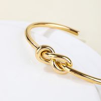 Stainless Steel 14K Gold Plated Vintage Style Simple Style Solid Color Knot Bangle main image 4