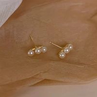 1 Pair Casual Simple Style Solid Color Round Inlay Alloy Pearl Ear Studs main image 5