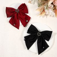 Women's Elegant Heart Shape Bow Knot Satin Inlay Artificial Diamond Hair Clip main image 1