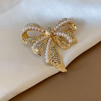 Moda Oval Flor Mariposa Cobre Embutido Diamantes De Imitación Perla Mujeres Broches sku image 80