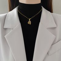 Titan Stahl IG-Stil Aushöhlen Inlay Liebe Herzform Künstliche Edelsteine Halskette Mit Anhänger main image 3