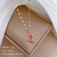 Titan Stahl IG-Stil Aushöhlen Inlay Liebe Herzform Künstliche Edelsteine Halskette Mit Anhänger sku image 2